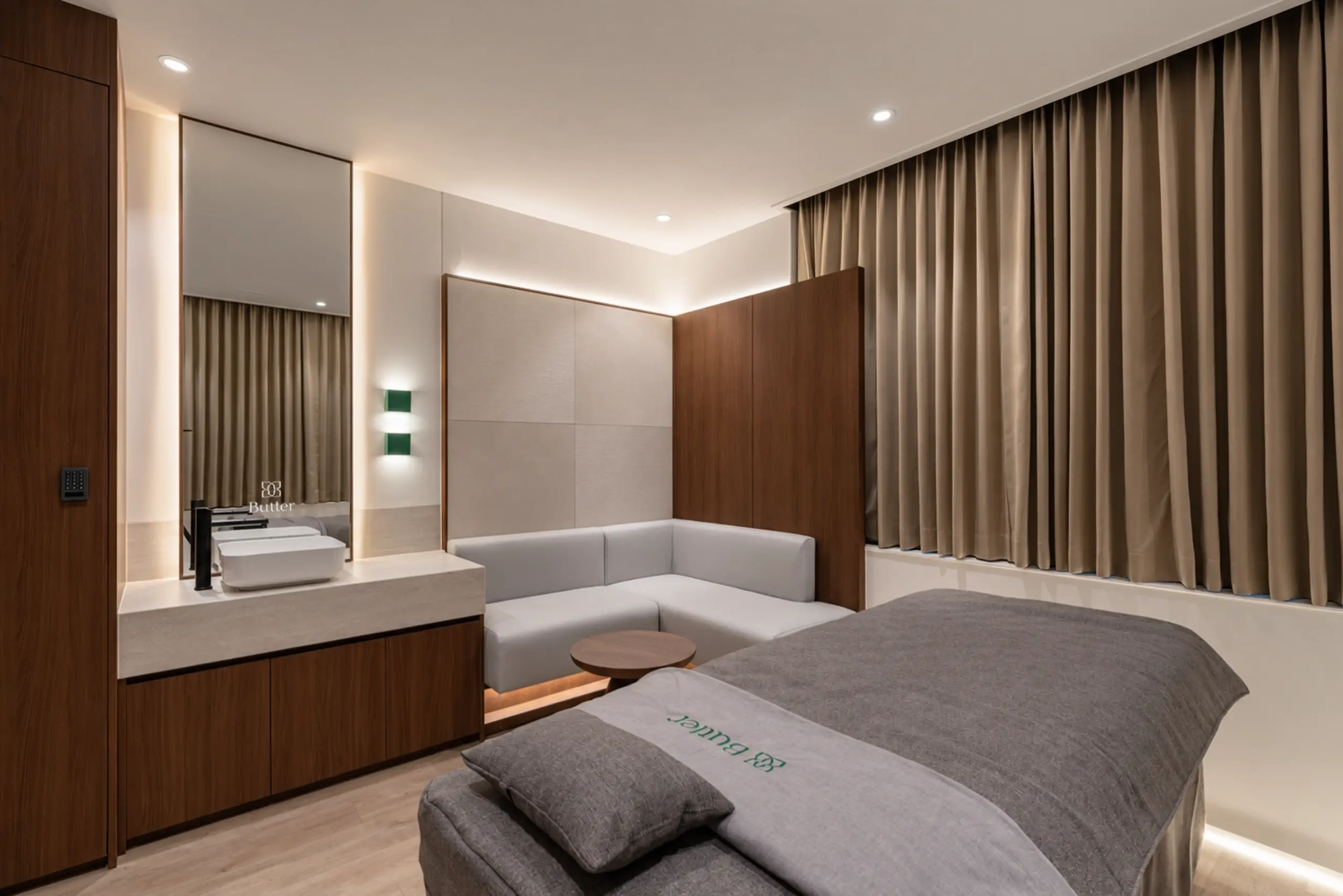 Treatment room divided by curtains