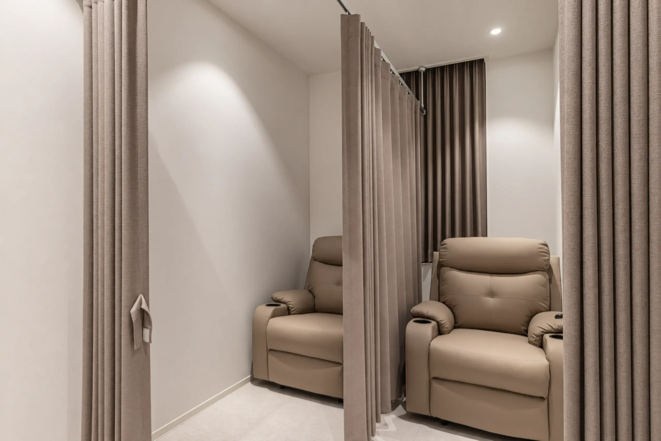 Recovery seats divided by curtains